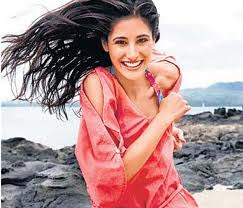 Nargis Fakhri beach image