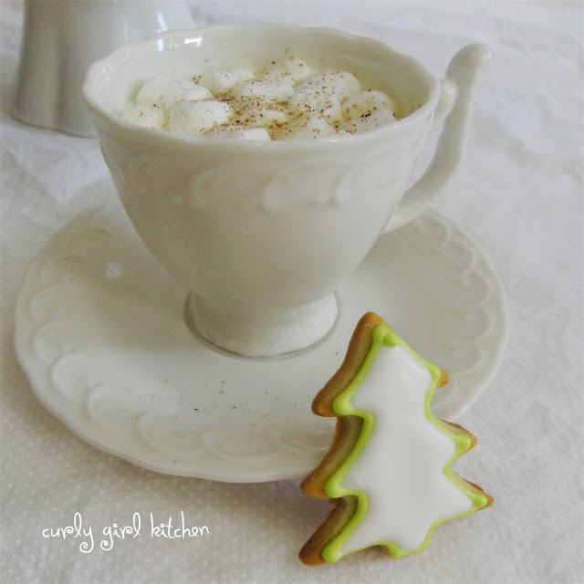 a Cup of White Hot Chocolate, and decorating Christmas cookies...