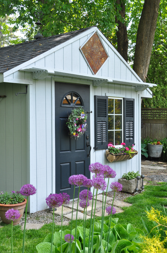 three dogs in a garden: garden sheds: everything from