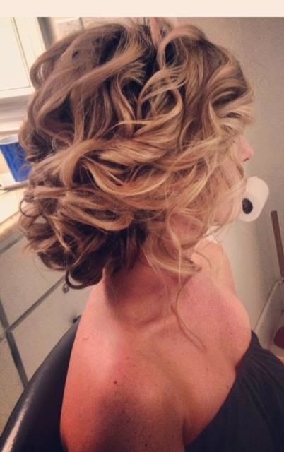 Beautiful and soft curls, lightly pinned up...what could work better This would be a perfect bridal hairstyle for a romantic bride.