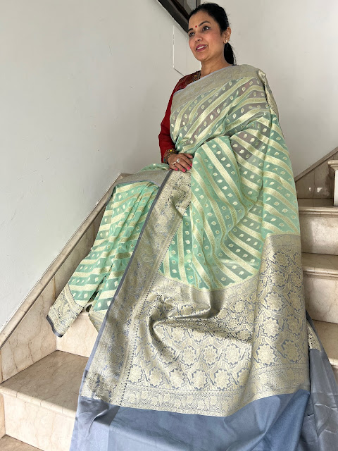 Sea green kora silk saree with silver mushroo silk border and pallu