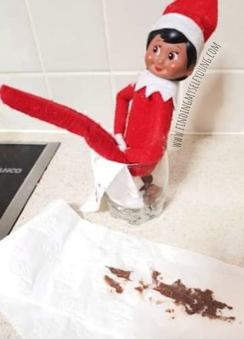 elf pooping in a glass