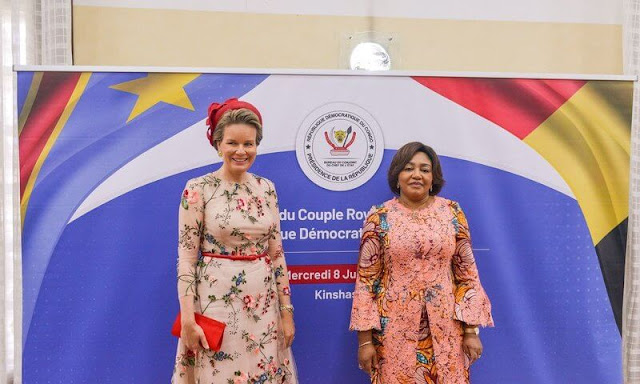 Queen Mathilde wore a flower pale pink midi dress from Natan. President Felix Tshisekedi and First Lady Denise Nyakeru
