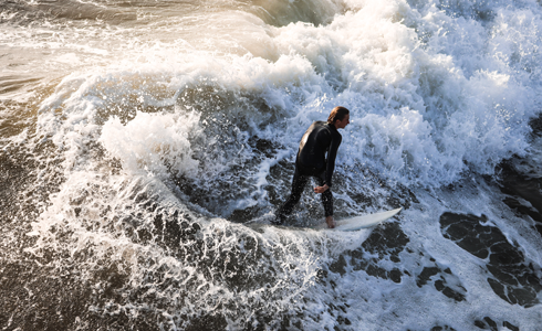 Manhattan Beach Pier Surfers Surfing California