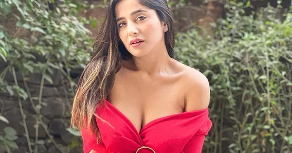 kate sharma cleavage red outfit