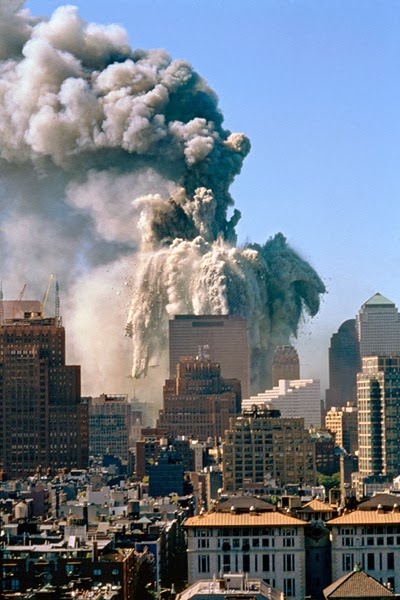 The collapse of World Trade Center Tower 1, the North Tower, seen from a roof at Washington Square Park and Fifth Avenue, New York, NY, September 11, 2001.<br />final print_milan