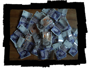 Used banknotes in a pile