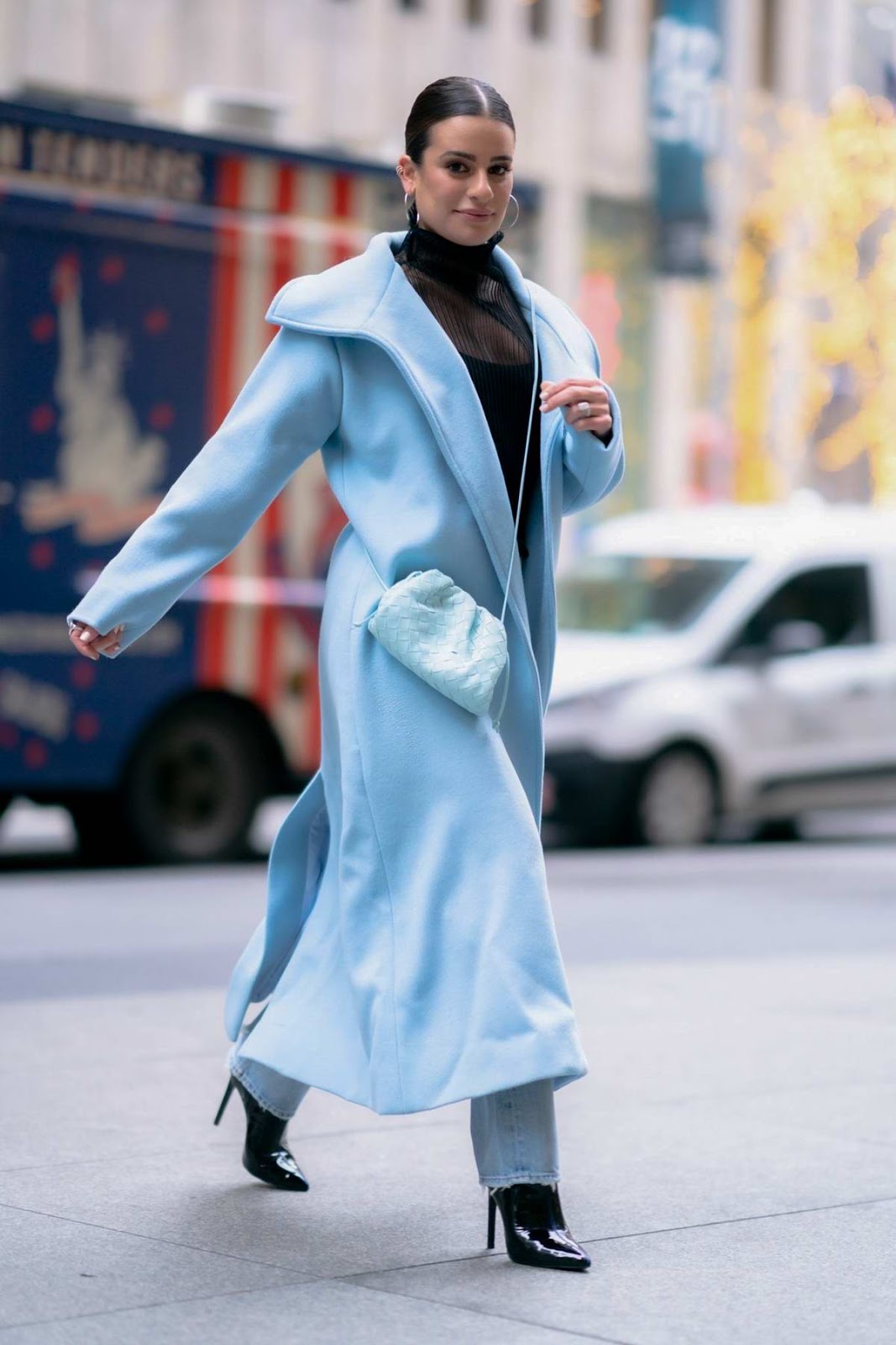 Lea Michele street style in a ice blue long coat in New York City