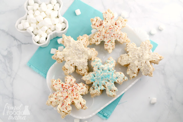 Classic Rice Krispies Treats get a winter wonderland makeover just in time for the holidays with these Sparkling Snowflake Rice Krispies Treats.