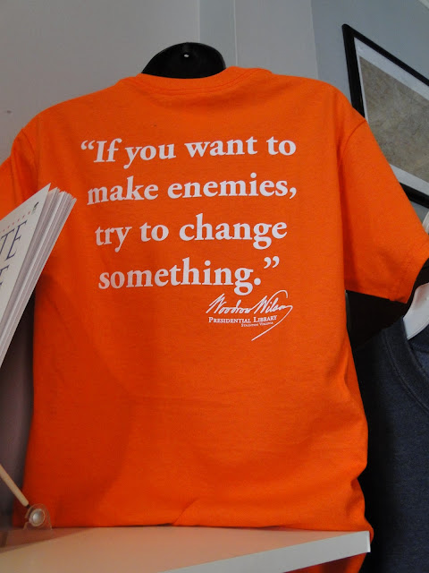 orange T-shirt with saying