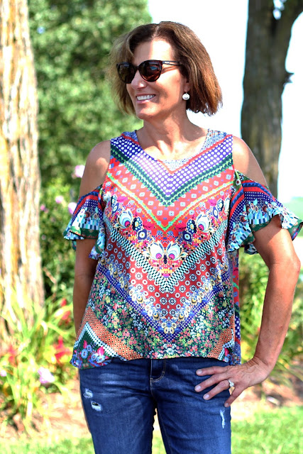 McCall's 7510 cold shoulder top made from a Mood Fabric's print