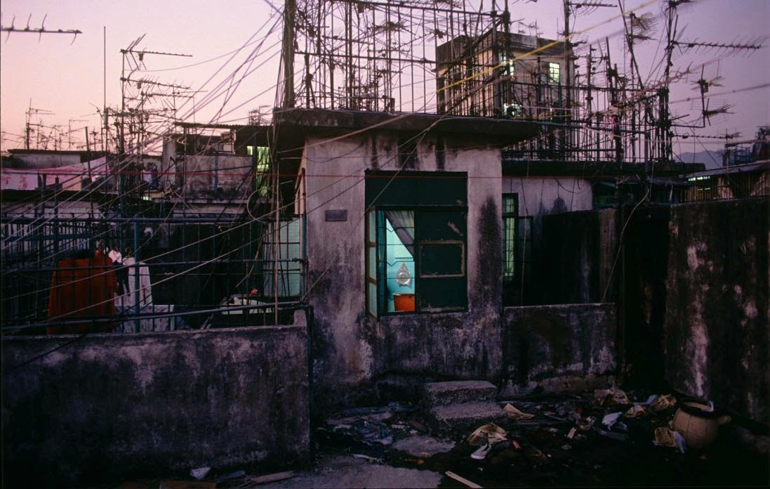 Amazing Photographs Capture Daily Life in Kowloon Walled 