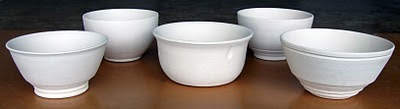 Image of five bisqued unique unglazed clay bowls