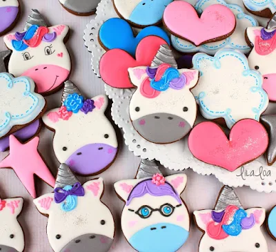 Unicorn decorated sugar cookies with cloud and heart cookies