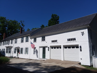 Large white house freshly painted