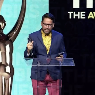 Dallas Taylor accepting an Ambie Award