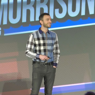 Picture of Anthony Morrison giving a speech on the stage