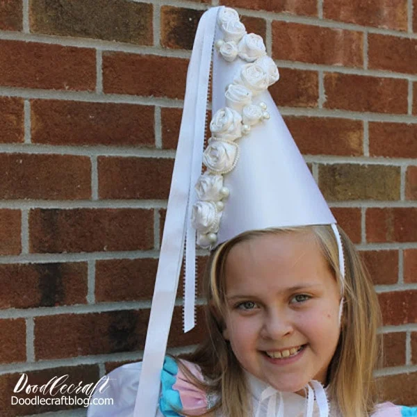 Make a princess hennin or pointy hat for the perfect princess dress up party.