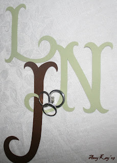 ... cut letters to decorate. I liked using them as a prop for the rings