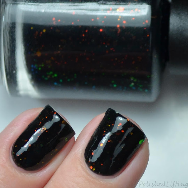 navy blue nail polish with color shifting glitter