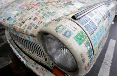 Car covered with thousands of stamps