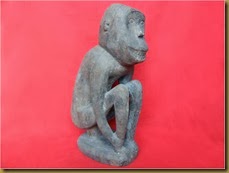 Primitive monkey wooden statue