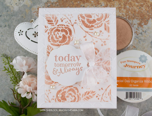 This pretty wedding card, in white and rose gold, was created using Fun Stampers Journey Happy Wedding Day stamp set, and the Flower Power stencil.  