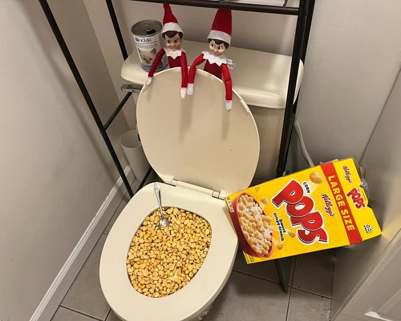elf filled toilet with cereal