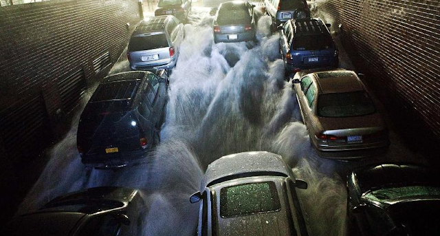 FLOOD: The water column has been squeezed into a parking garage in the financial center of New York.