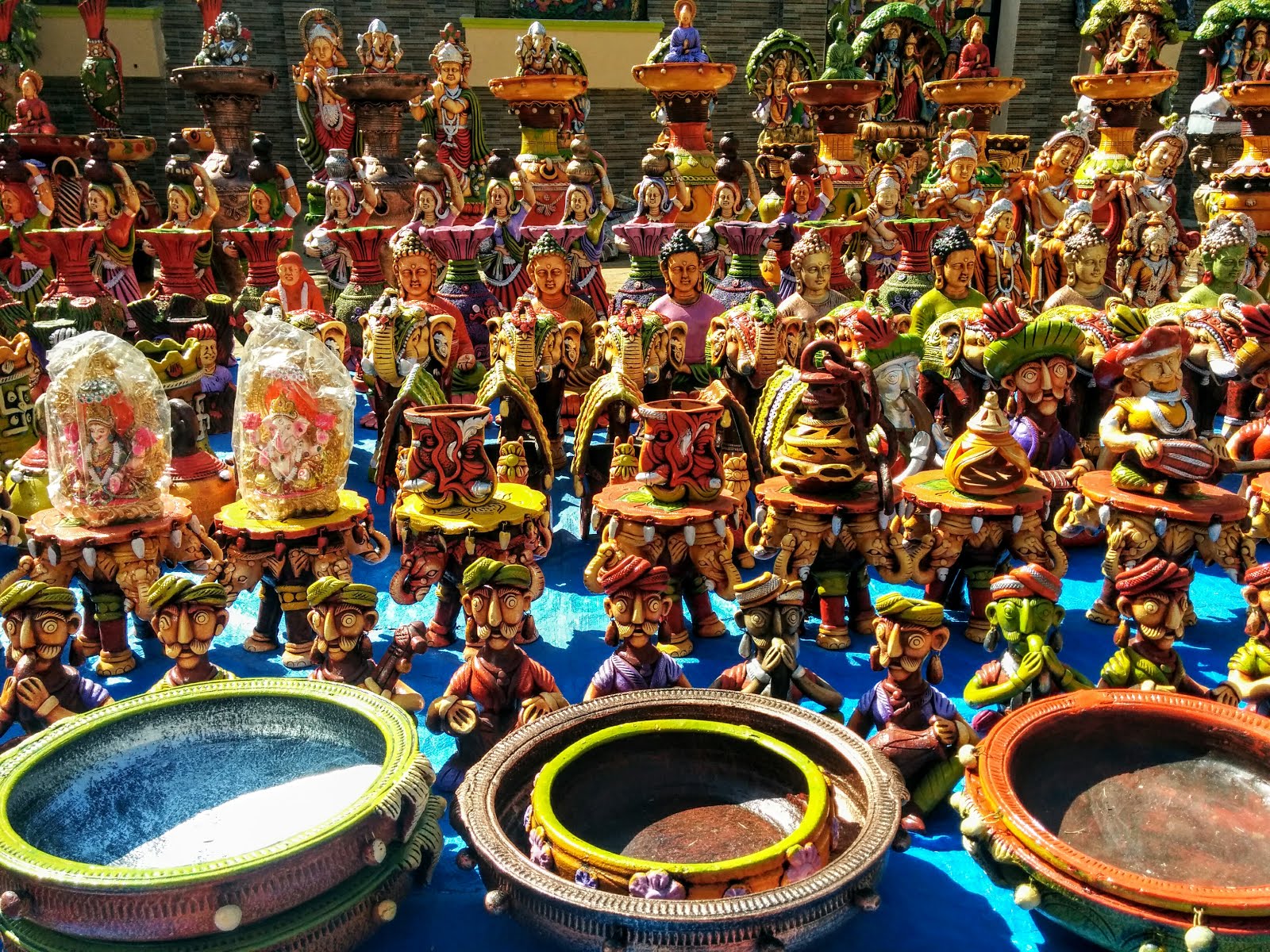 Colorful Pottery on Display at Kadalekai Parishe