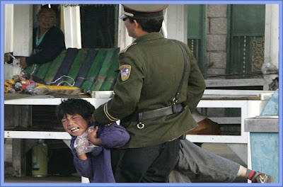 Chinese Police Arresting Tibetan Protestor