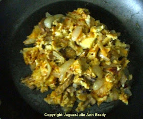 step four Cheesy Scrambled Eggs with Mushrooms and Onions