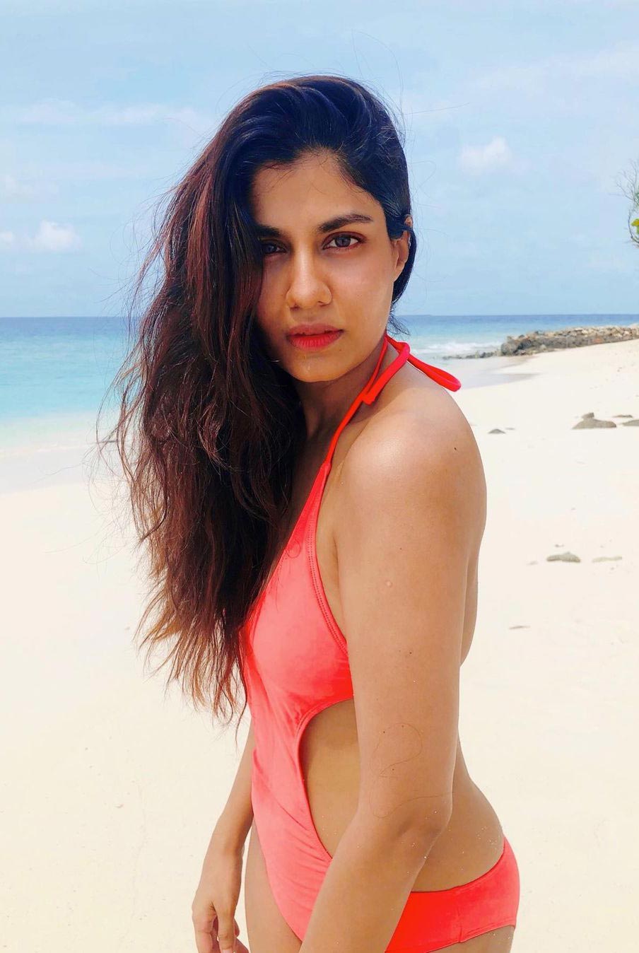 Shreya Dhanwanthary red swimsuit sexy body