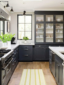 open spaces with dark kitchen cabinets