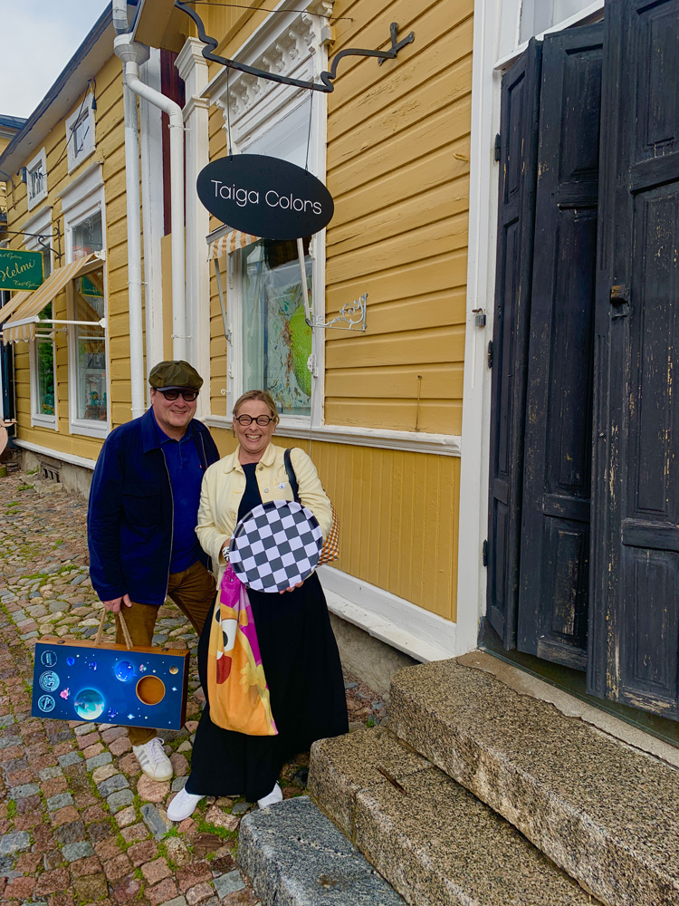 A couple standing in front of our new store on Välikatu, Porvoo