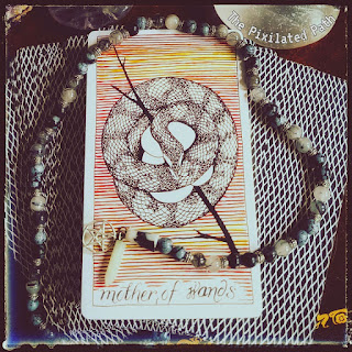 Mother of Wands card from The Wild Unknown Tarot
