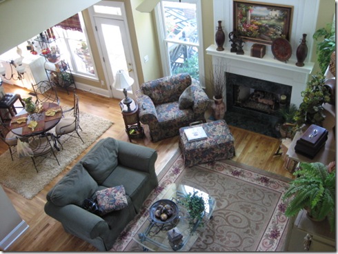 Greatroom looking into kitchen area and onto back porch.