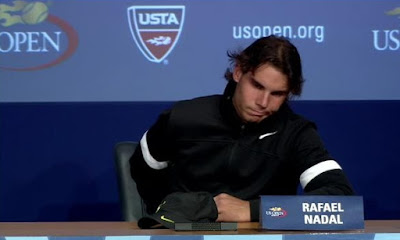 Rafael Nadal press conference US Open day two round one black white jacket grimace screencaps images photos pictures