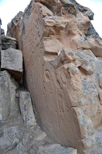 more thick carvings on large, flat panel