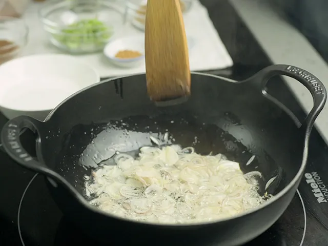 Add garlic once the shallots has wilted