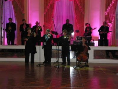 for a wedding a beautifully decorated ballroom bathed in pink light