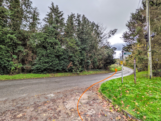 Turn right on the lane then take the footpath on the left