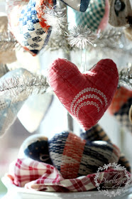 Tinsel tree decorated with handmade homespun ornaments.