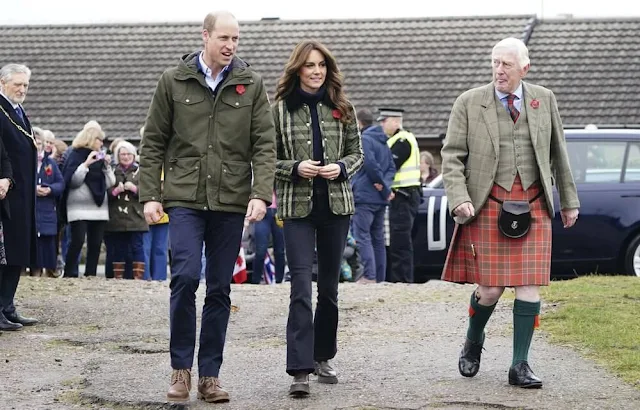 Princess of Wales wore a check diamond quilted coat by Burberry with a pair of flared jeans at Burghead Primary School