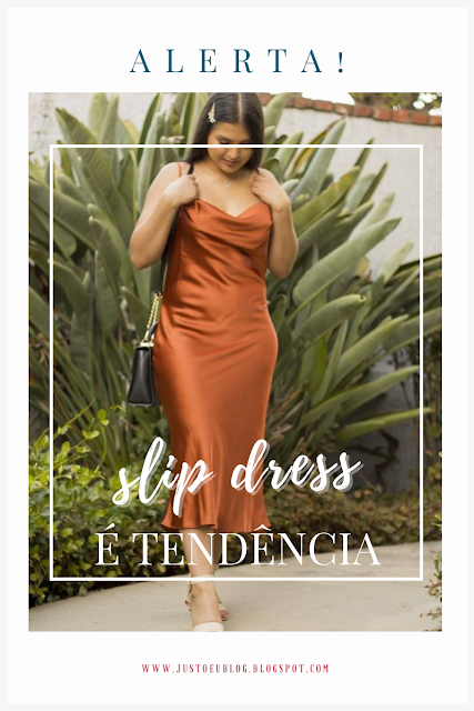 alerta! slip dress é tendência foto ao fundo de mulher branca com vestido de cetim laranja