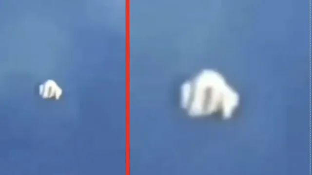 A UFO sighting that's been filmed from an airplane window of a strange shaped craft.