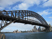 A recent cloudy Autumn sky above the Sydney Harbour Bridge with the Sydney . (sydney harbour bridge)