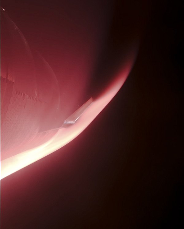 Starship is nearly engulfed by the plasma field as it re-enters Earth's atmosphere in an attempt to complete Integrated Flight Test 3...on March 14, 2024.