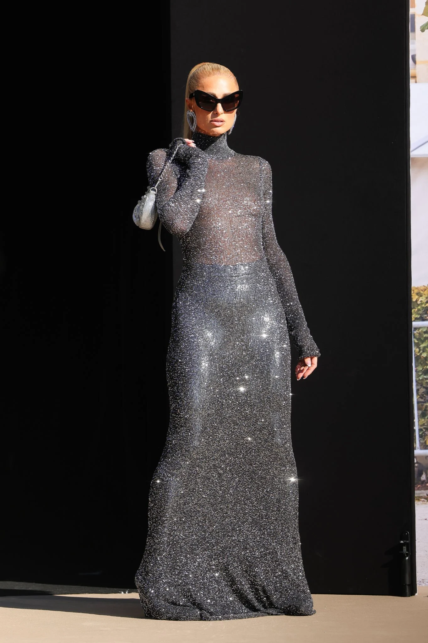 Paris Hilton wows in a dazzling silver gown