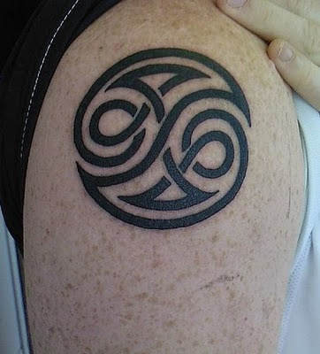 Ying Yang Tribal Tattoos Desings